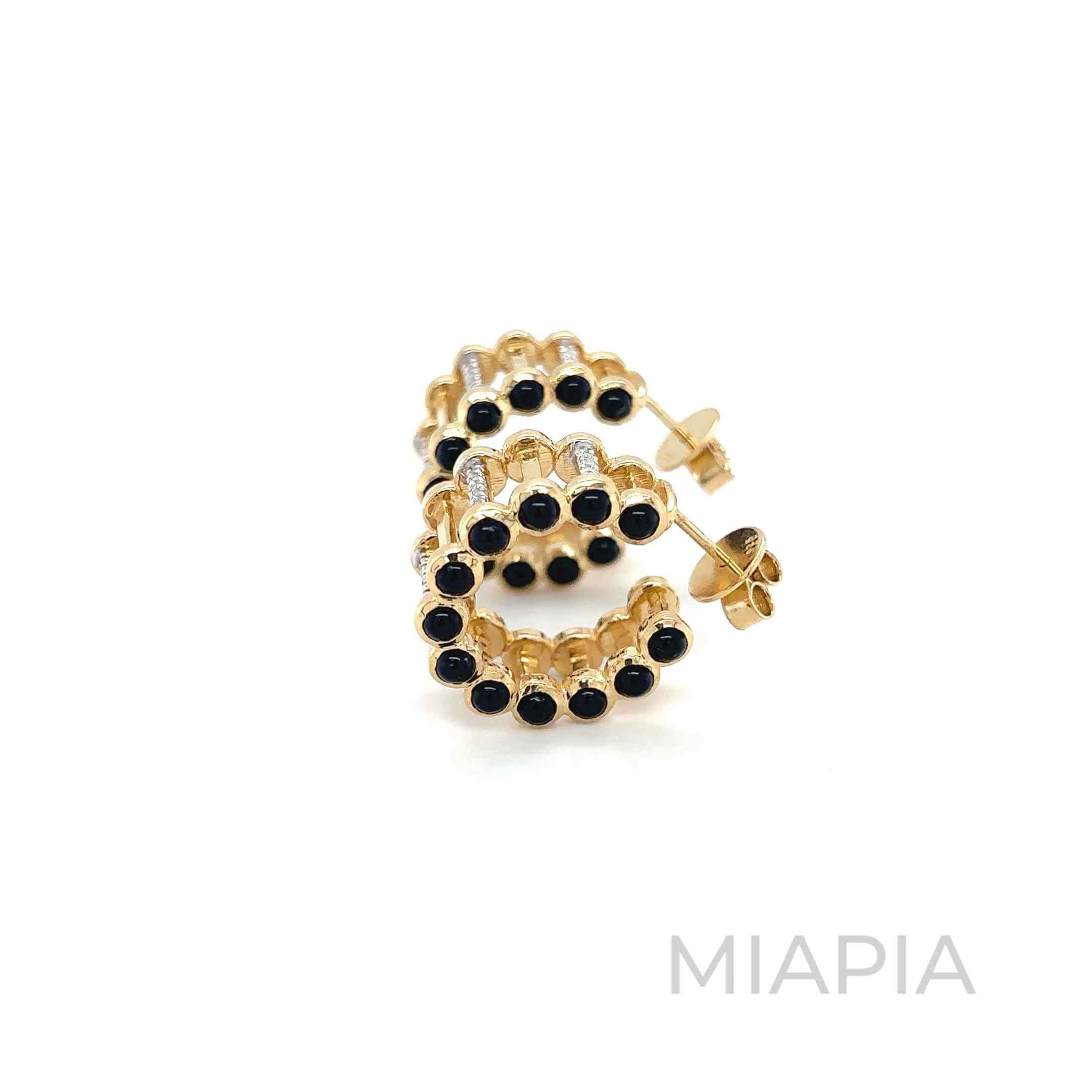 Eterna Hoop Puzzle Earrings