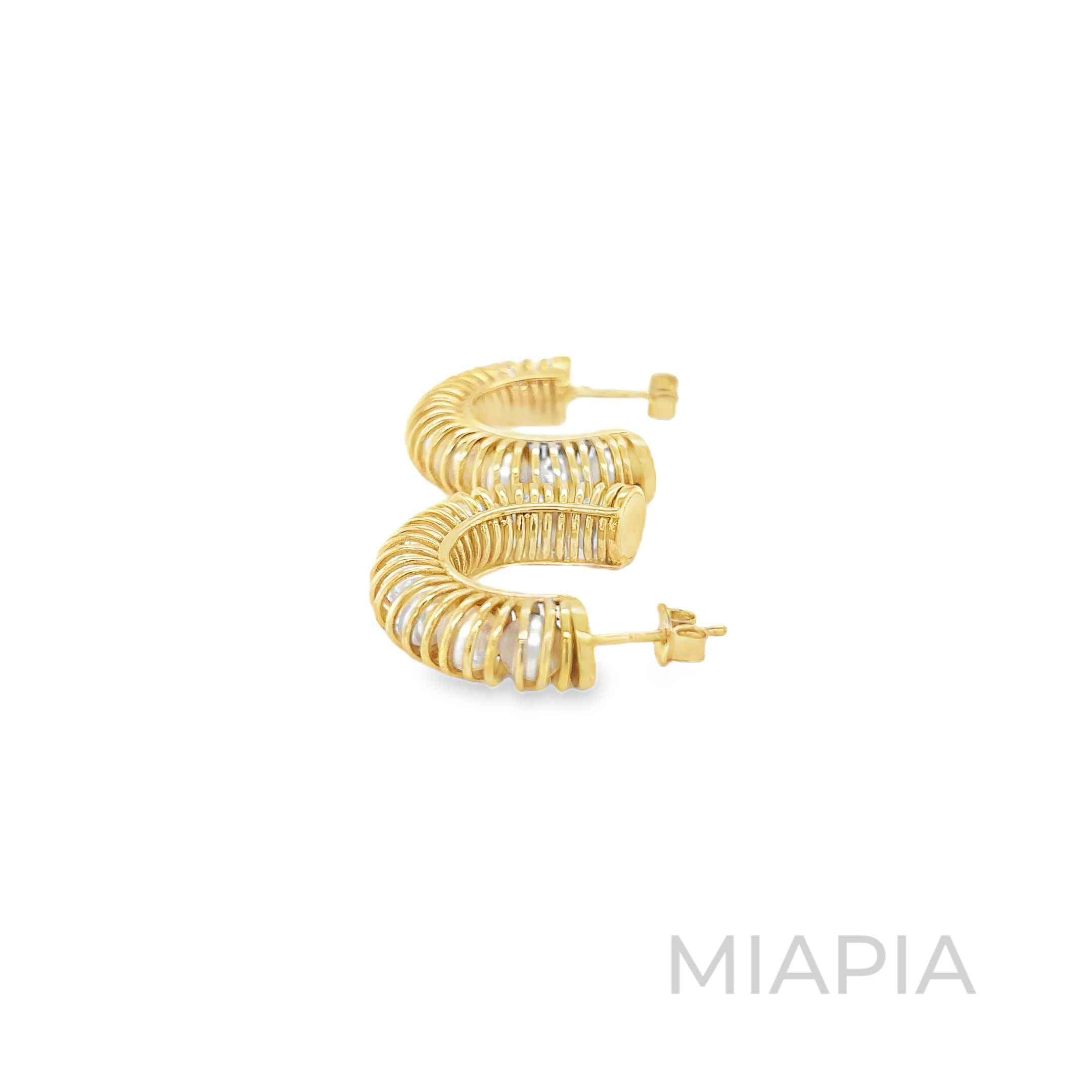 Spiral Hoops with Hidden Pearls