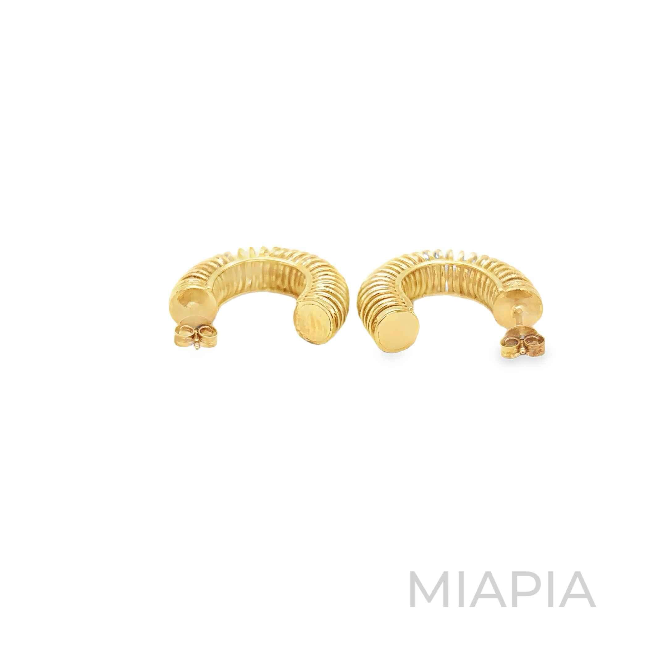 Spiral Hoops with Hidden Pearls