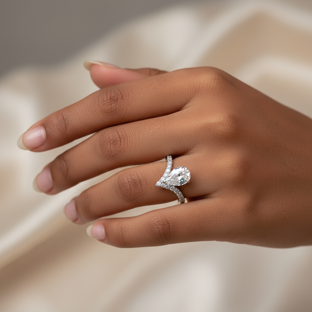 1.5 Carat Pear Moissanite V-Cut Halo Ring